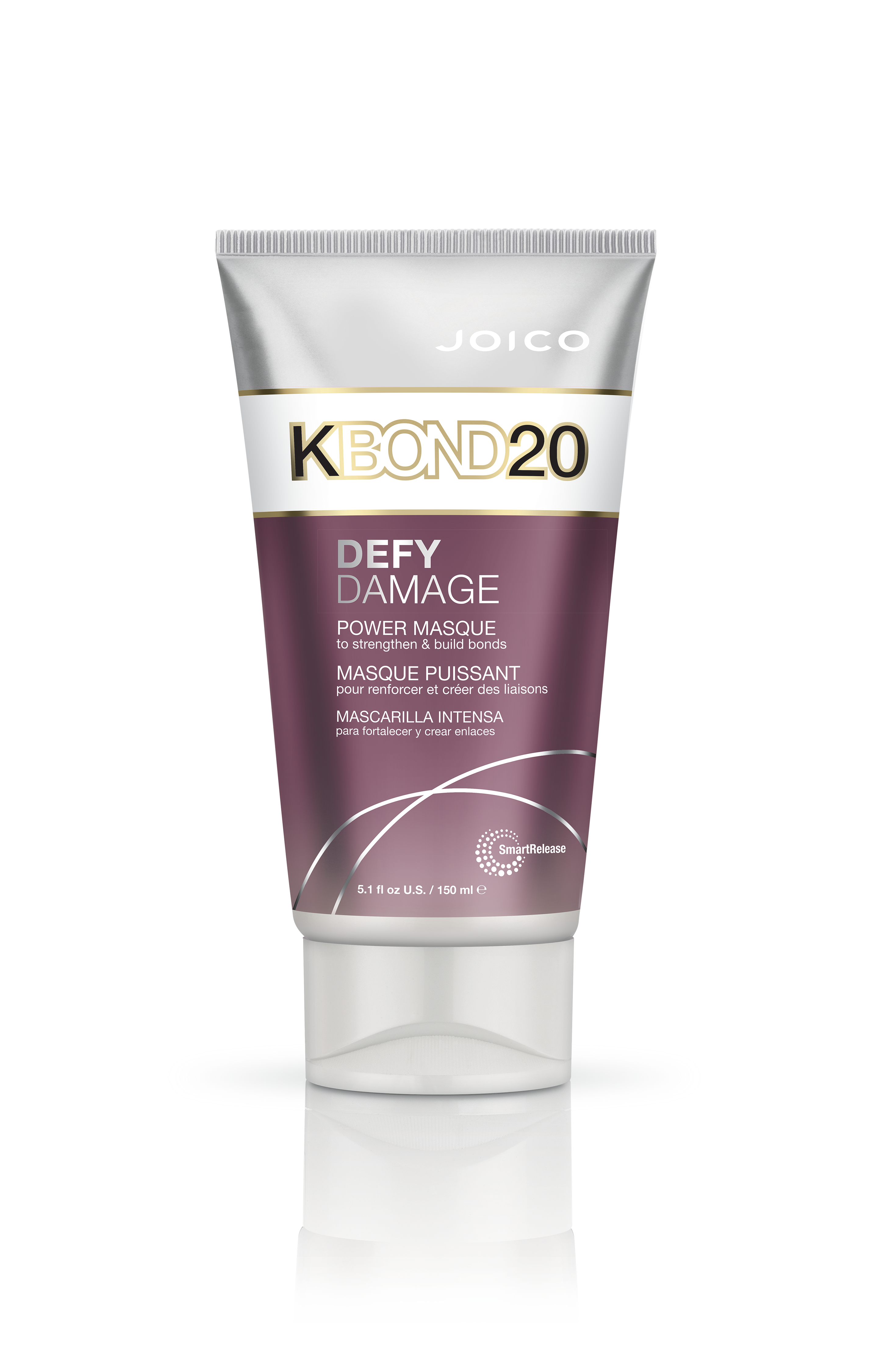 Hand holding black machined steel mechanical pencil with brass tip and top.